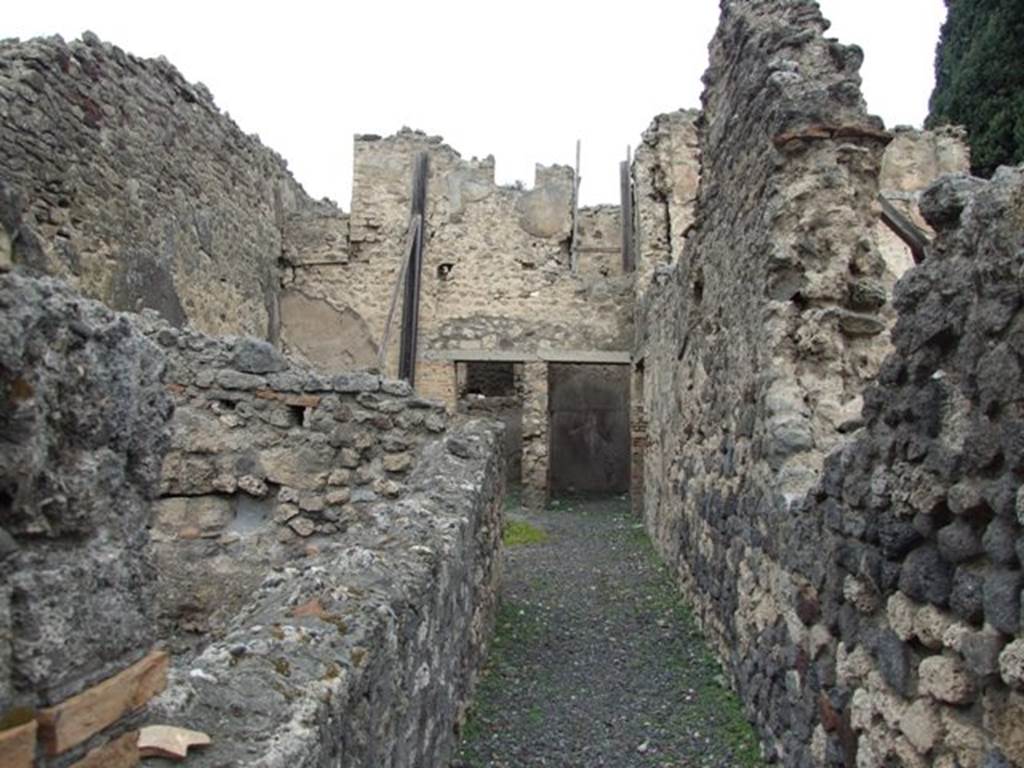 VIII.4.37 Pompeii. House with workshop. December 2007. Looking north to two rooms and remains of doorway in upper floor.