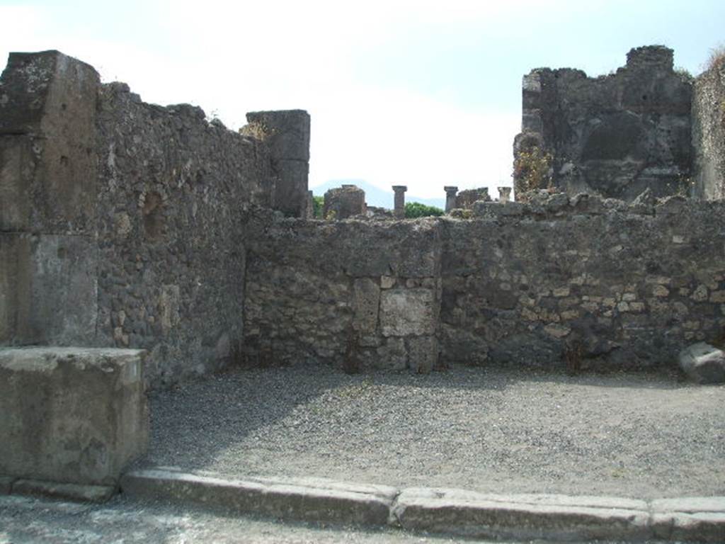 VIII.5.1 Pompeii. May 2005. East side of shop, with niche in east wall.
According to Boyce, the arched niche was called by Fiorelli “la nicchia dei Penati”.
See Boyce G. K., 1937. Corpus of the Lararia of Pompeii. Rome: MAAR 14. (p.76, no.364)
See Pappalardo, U., 2001. La Descrizione di Pompei per Giuseppe Fiorelli (1875). Napoli: Massa Editore. (p.163).
According to Fiorelli, this shop originally had a doorway at the rear, that would have linked it with the atrium of VIII.5.2, but then was blocked up.
See Fiorelli, G. (1875). Descrizione di Pompei, (p.446).