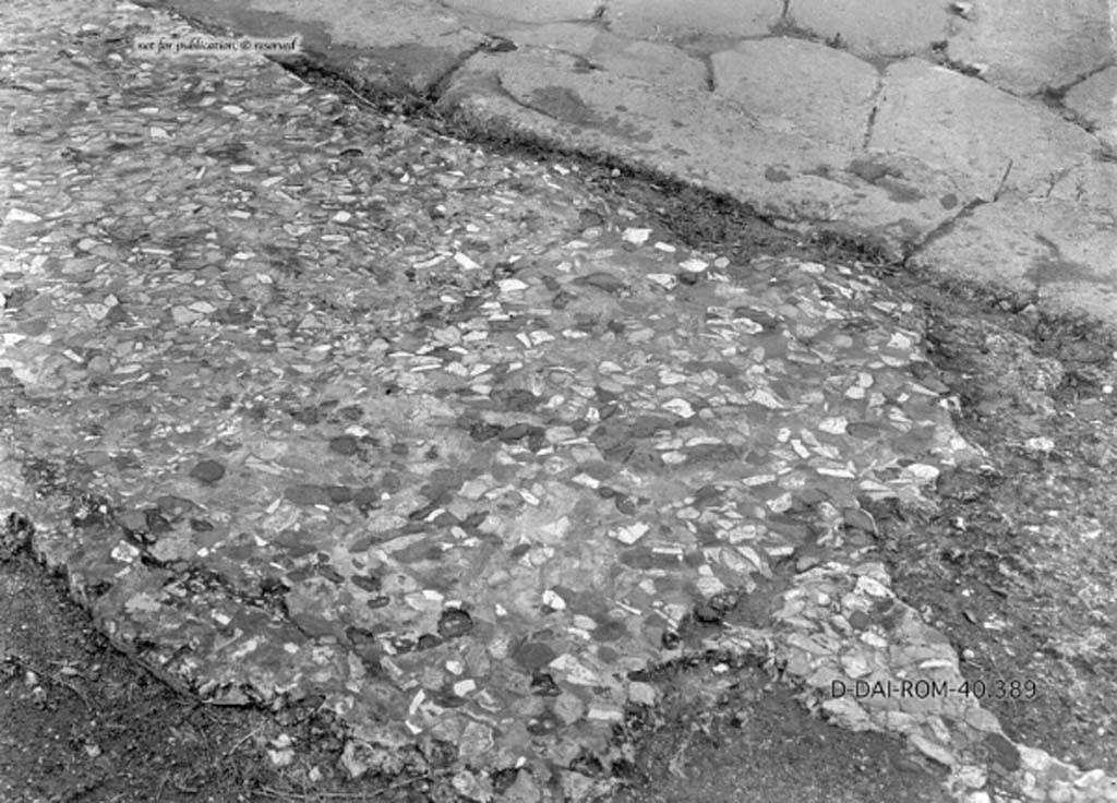 VIII.5.2 Pompeii. c.1930. Flooring of the pavement in front of the house on south side of Via dell’Abbondanza.
DAIR 40.389. Photo © Deutsches Archäologisches Institut, Abteilung Rom, Arkiv.
See Pernice, E. 1938. Pavimente und Figürliche Mosaiken: Die Hellenistische Kunst in Pompeji, Band VI. Berlin: de Gruyter, see tav. 14.5, above.)