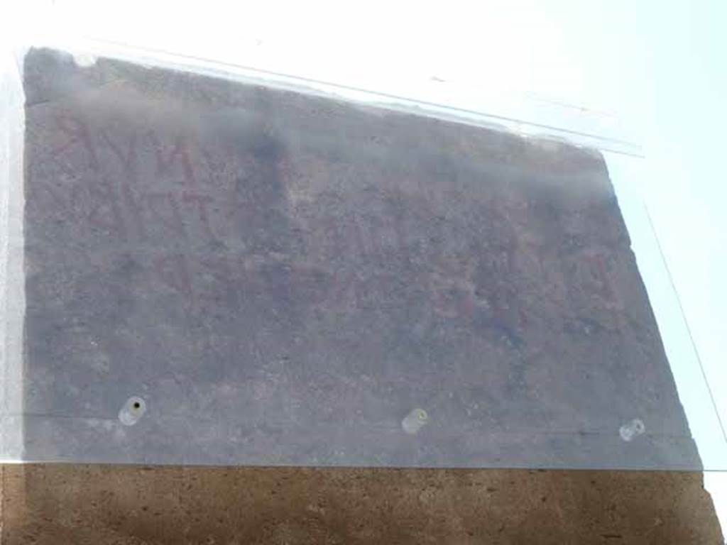 VIII.5.20 Pompeii, May 2010. “Eituns” on west pilaster between VIII.5.19 and VIII.5.20. (see VIII.5.19)