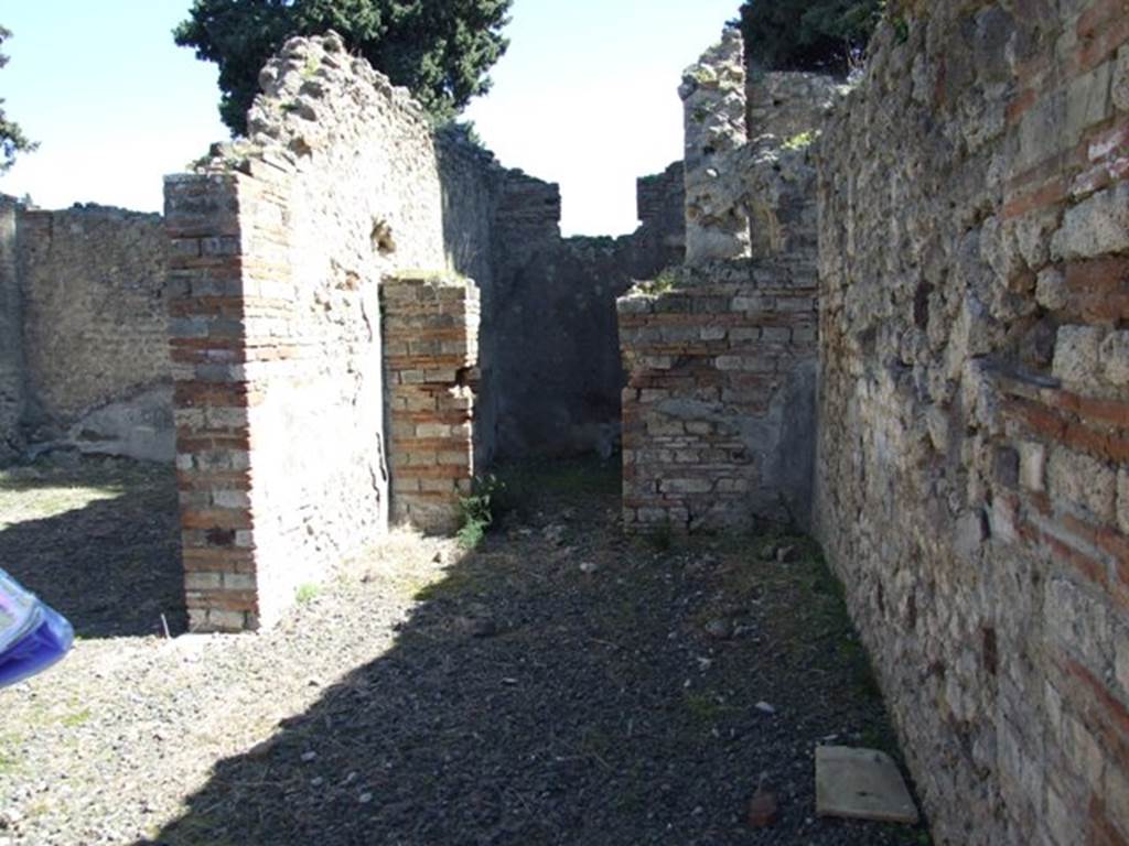 VIII.5.37 Pompeii. March 2009. Room 6, Corridor. Looking east to Doorway to Room 7, Cubiculum.