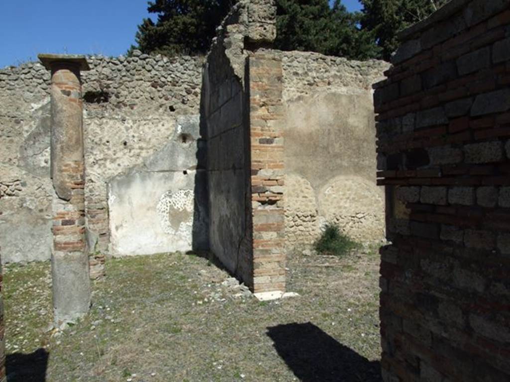 VIII.5.37 Pompeii. March 2009. Room 6, Corridor, leading into East Portico. Looking north to second doorway to Room 8 in west wall.