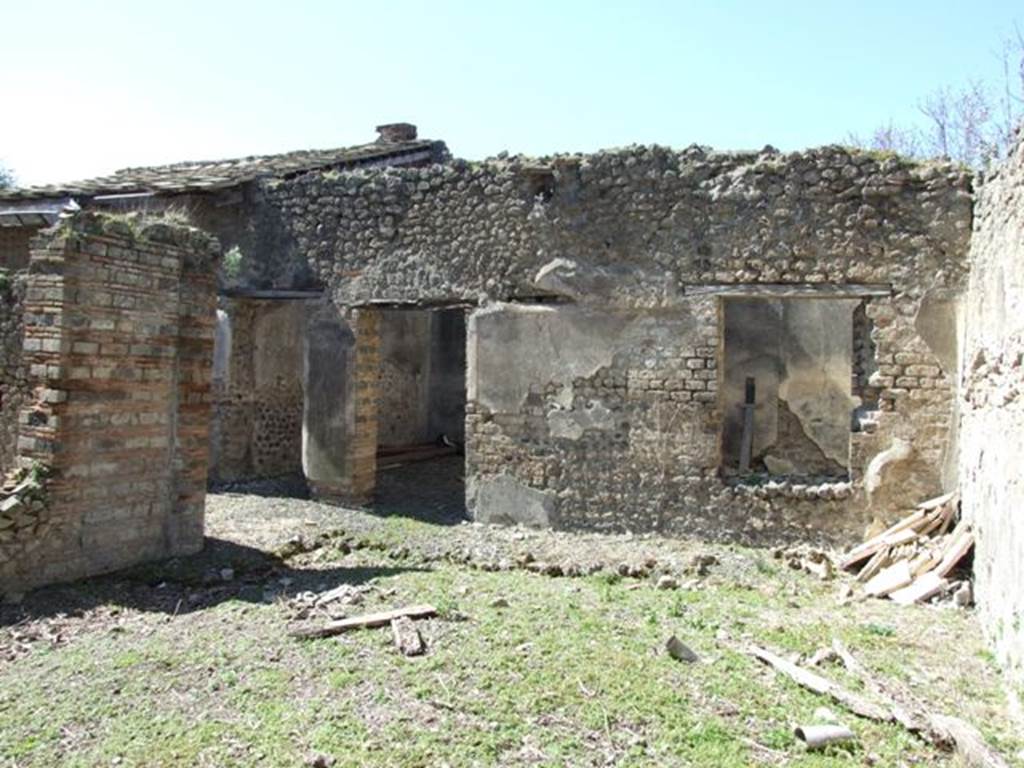 VIII.5.37 Pompeii. March 2009. Room 9, Garden area, looking west towards Rooms 11 and 12.