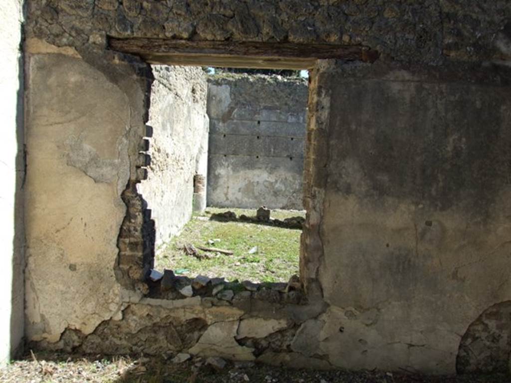 VIII.5.37 Pompeii. March 2009. Room 12. East wall, with window overlooking garden.