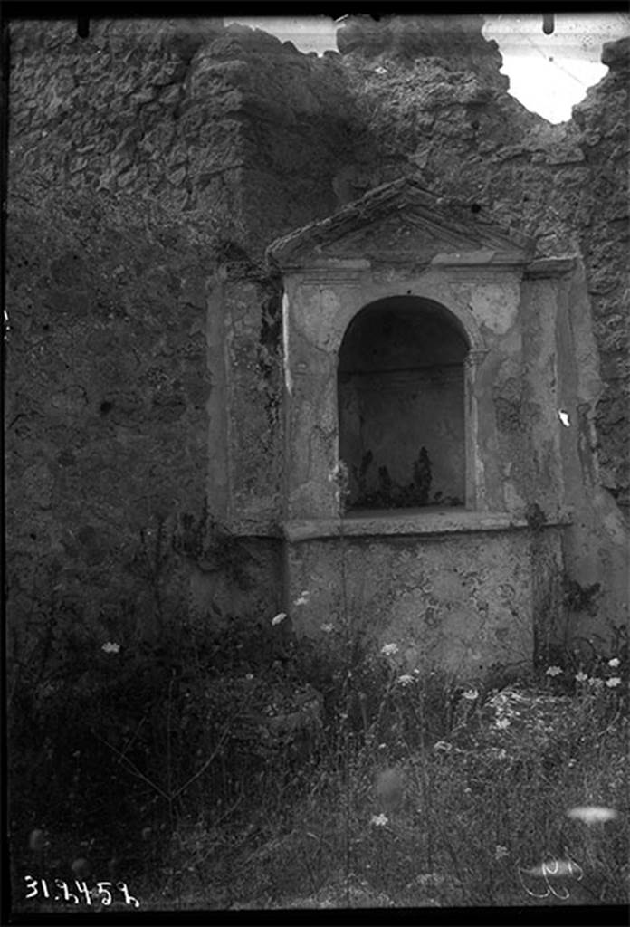 VIII.6.6 Pompeii. 1931. Niche in south-west corner.
DAIR 31.2452. Photo � Deutsches Arch�ologisches Institut, Abteilung Rom, Arkiv. 
See Boyce G. K., 1937. Corpus of the Lararia of Pompeii. Rome: MAAR 14. (p.78, No.374, Pl.33,1)