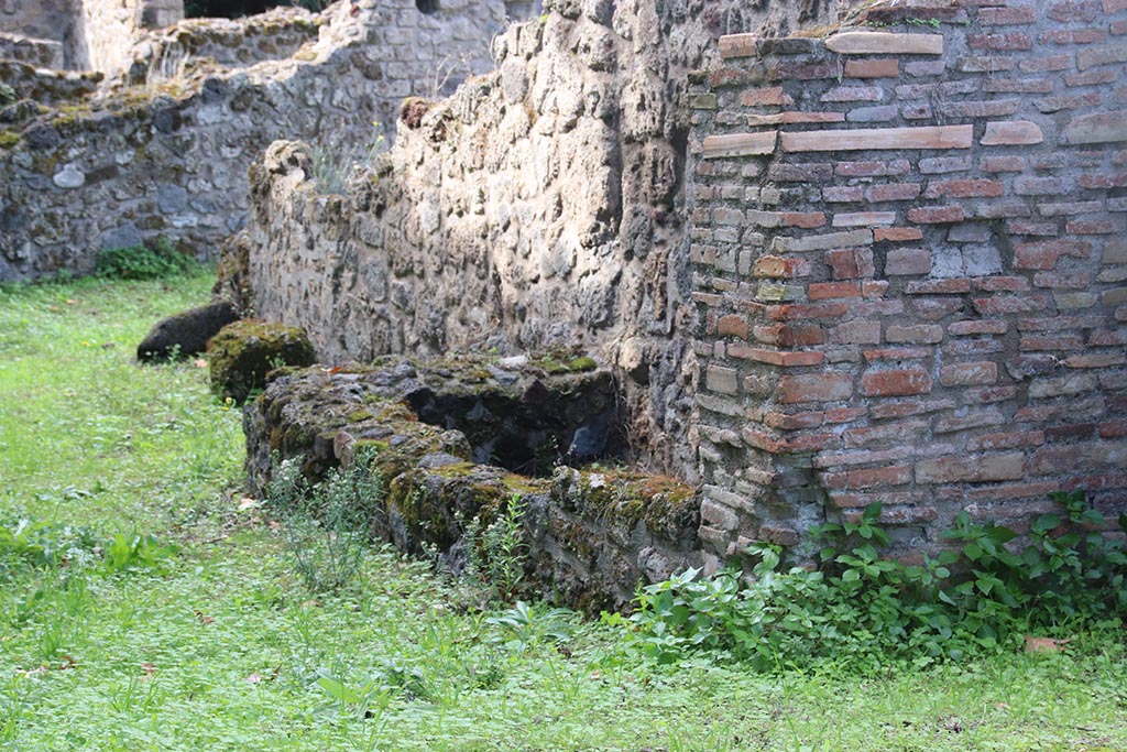 VIII.7.1 Pompeii. October 2024.
Looking north-west to detail of north wall, three rectilinear basins or watering troughs for horses? Photo courtesy of Klaus Heese.