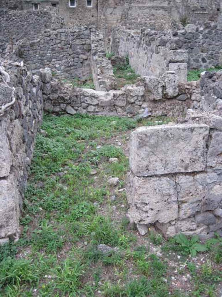 VIII.7.8 Pompeii. September 2010. Doorway to cubiculum on west side of shop. Photo courtesy of Drew Baker. According to Della Corte, in 79AD in this ample shop with several communicating rooms, lived one Marcus Surus. We cannot guess what commerce or industry was carried on in his shop. However, we do know he was a veteran of the Misenum fleet, in which he had served for 26 years as a rower. He was of Gerasa, a city of the Decapolis in Jordan/Palestine, and had transferred to Pompeii from Paestum. In his cubiculum where he slept, was found preserved the authentic copy in bronze of the decree of his discharge in the year 71AD by Vespasian, by which he was accorded Roman citizenship. This decree was found on 16th July 1874 and is CIL X 867, and names M. Damae f. Suro Garaseno. See Della Corte, M., 1965. Case ed Abitanti di Pompei. Napoli: Fausto Fiorentino. (p.263). See Wikipedia for description of ten cities of Decapolis. Now in Naples Archaeological Museum. Inventory number 110043.