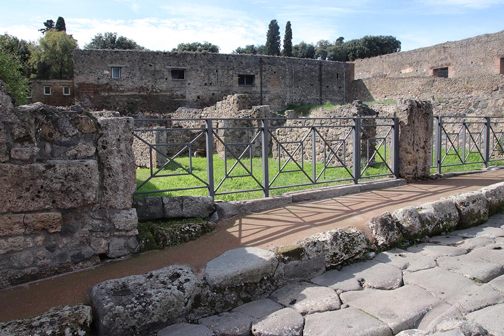 VIII.7.10 Pompeii. October 2024. 
Looking north-west from Via Stabiana towards entrance doorway, on north side of doorway into VIII.7.9. Photo courtesy of Klaus Heese.
