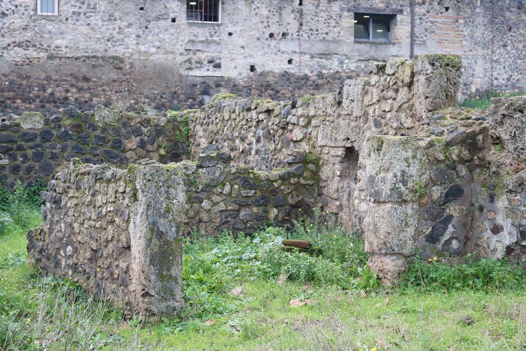 VIII.7.10 Pompeii. December 2018. 
Looking towards rear room of shop-room, with a niche/recess in the north wall? Photo courtesy of Aude Durand.
