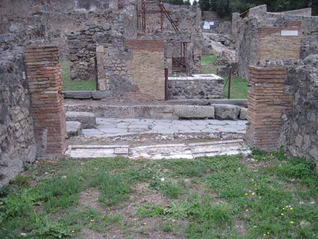 VIII.7.12 Pompeii. September 2010. Looking south at the west side of the kitchen area. Photo courtesy of Drew Baker.