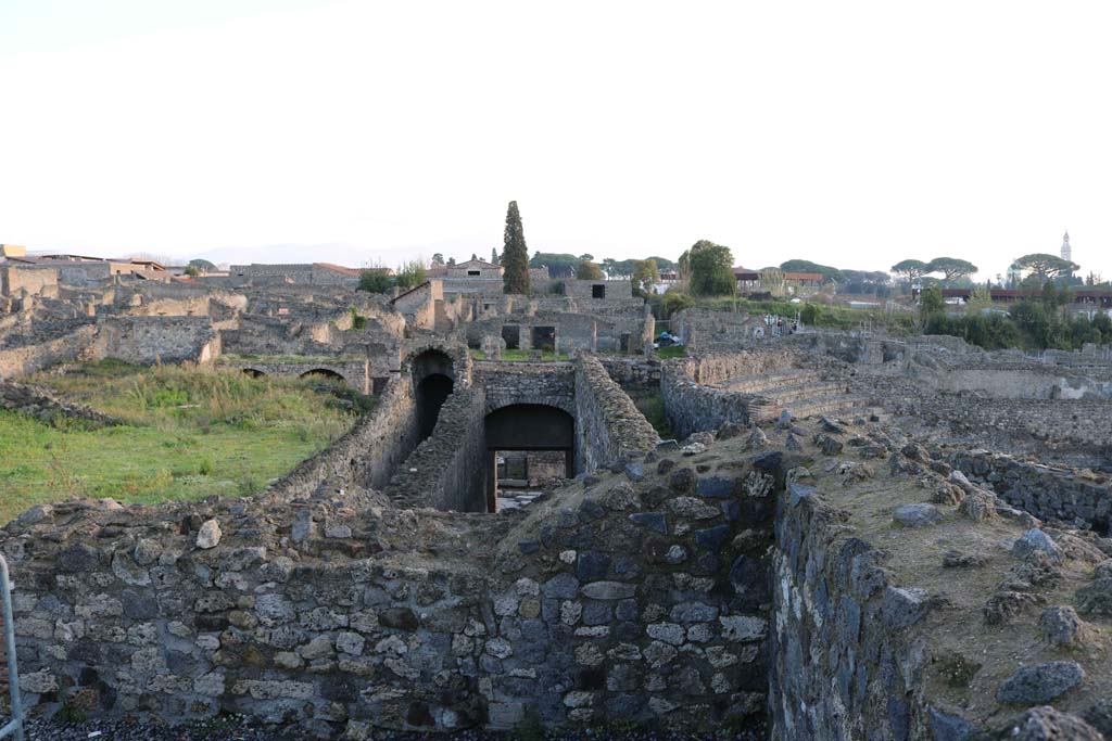 VIII.7.21 Pompeii, on left, and VIII.7.20, in centre. December 2018.
Looking east from entrance corridors towards Reg. 1, insula 3. Photo courtesy of Aude Durand.