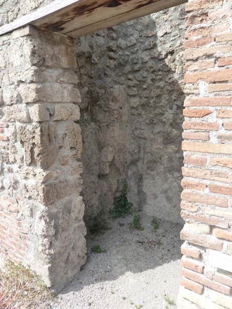 VIII.7.23 Pompeii. September 2010. West wall. Photo courtesy of Drew Baker. This is most likely the site of the internal two small rooms. There may be the remains of an arched ceiling, on the right.
