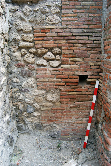 VIII.7.23 Pompeii. June 2009. Looking east in kitchen on southern boundary. Photo courtesy of Sera Baker.
