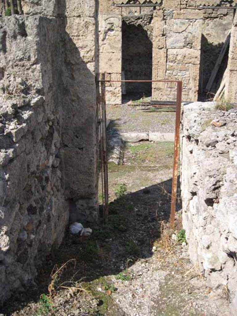 VIII.7.24 Pompeii. September 2010. Looking north from top of stairs, looking down into atrium. Photo courtesy of Drew Baker.