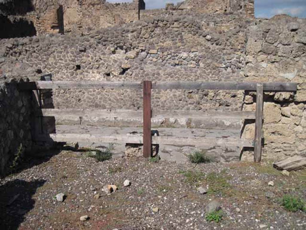 VIII.7.26 Pompeii. September 2010. Looking north across first room on the east onto Via del Tempio d�Iside. Photo courtesy of Drew Baker.
