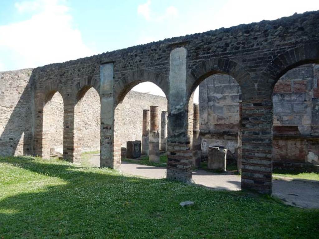 VIII.7.28, Pompeii. May 2015. Looking out through the arches of the Ekklesiasterion on to the west portico and north portico.
Photo courtesy of Buzz Ferebee.