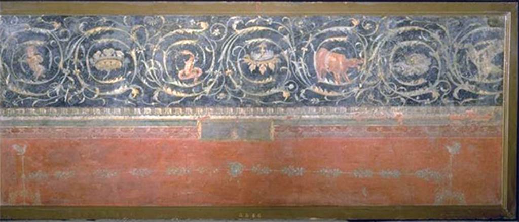 VIII.7.28 Pompeii. From the south part of the west portico
Painting of upper part of wall with spiral frieze.
In the red panel below are two candelabra each mounted by a dove.
Now in Naples Archaeological Museum. Inventory number 8546.
