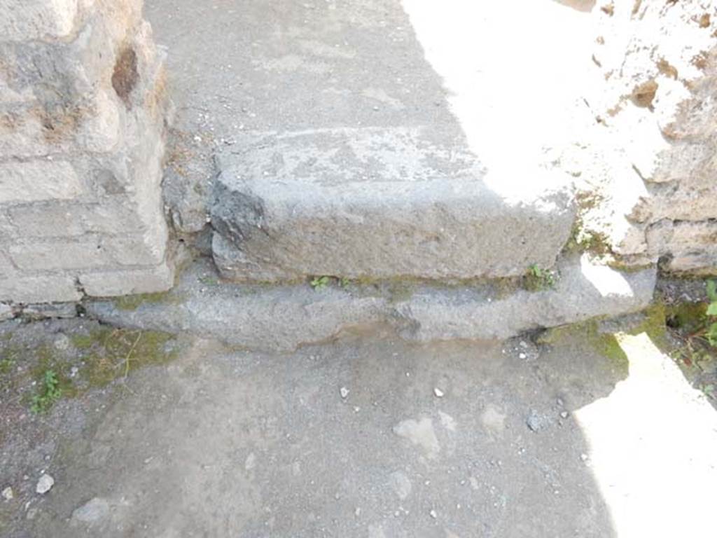 VIII.7.28 Pompeii. May 2015. Detail of threshold of doorway to kitchen. Photo courtesy of Buzz Ferebee.
