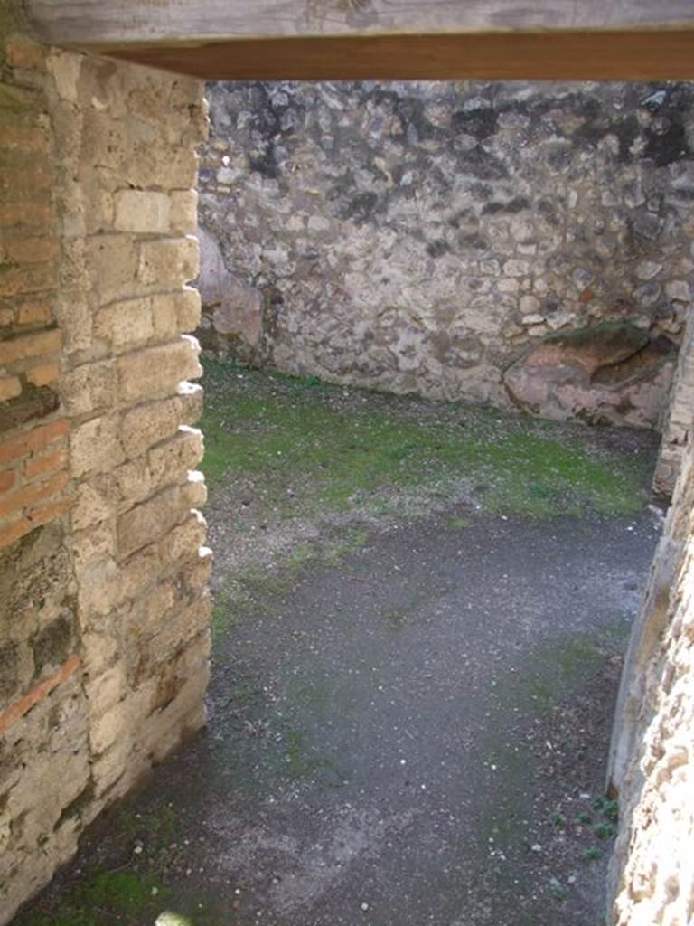 VIII.7.28 Pompeii. March 2009. Priest’s Kitchen. Door in west wall leading to Dining room.