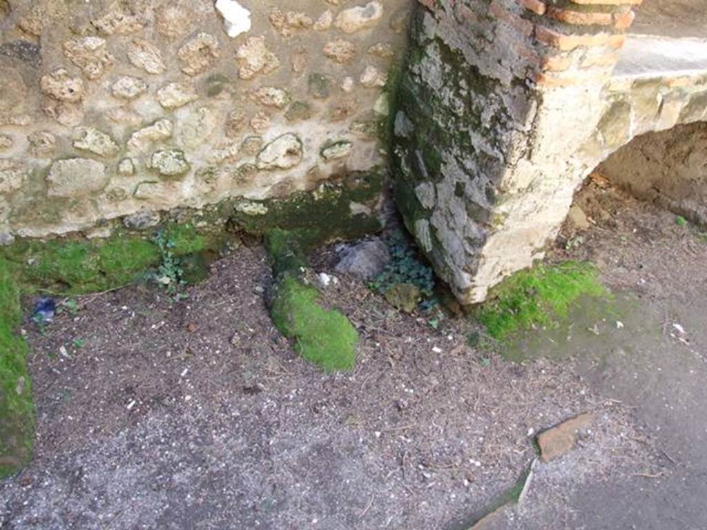 VIII.7.28 Pompeii. March 2009. Remains of structure against west wall in Kitchen.