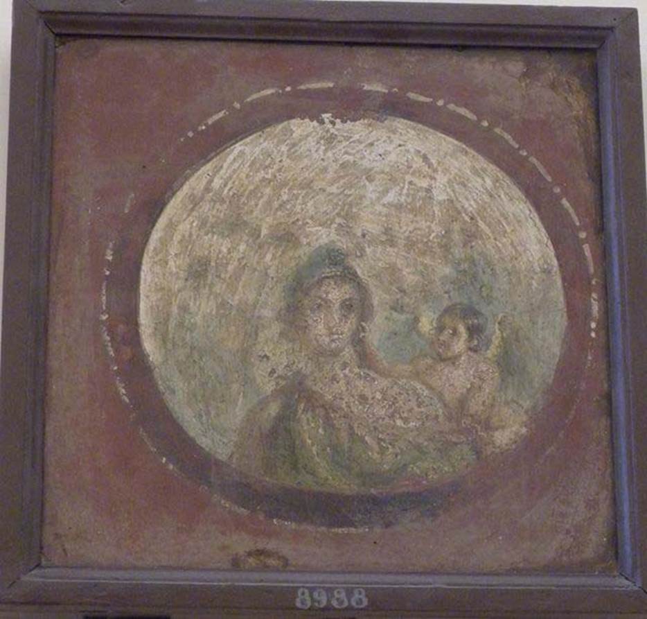 VIII.7.28 Pompeii. Found 19 July 1766. Cubiculum.
Round painted medallion of Paris with cupid.
Now in Naples Archaeological Museum. Inventory number 8988.
See Bragantini, I and Sampaolo, V., Eds, 2009. La Pittura Pompeiana. Verona: Electa. p. 521, Scheda 301.
See Prisciandaro, R., 2006. Studio sulle provenienze degli oggetti rinvenuti negli scavi borbonici del regno di Napoli: Una lettura integrata, coordinata e commentata della documentazione Volume 1. Naples : Nicola Longobardi. (p. 57).
See Helbig, W., 1868. Wandgemälde der vom Vesuv verschütteten Städte Campaniens. Leipzig: Breitkopf und Härtel. (1271).