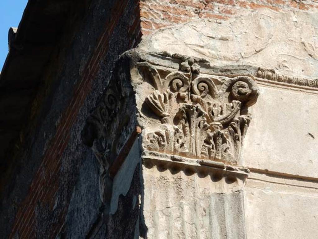VIII.7.28, Pompeii. May 2015. Detail of decorative capital on south-west corner of cella. Photo courtesy of Buzz Ferebee.