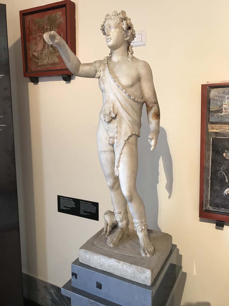 VIII.7.28 Pompeii. April 2019. Statue of Dionysus pouring wine into the mouth of the panther next to his feet.
Now in Naples Archaeological Museum. Inventory number 6312. Photo courtesy of Rick Bauer.