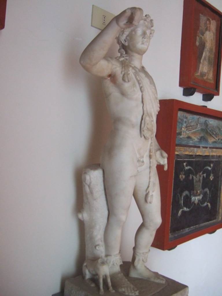 VIII.7.28 Pompeii. Statue of Dionysus pouring wine into the mouth of the panther next to his feet. Now in Naples Archaeological Museum.