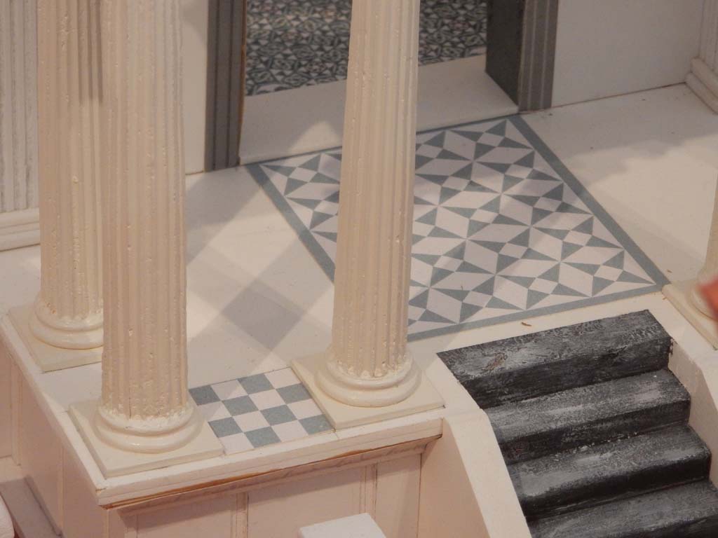 VIII.7.29 Pompeii. June 2019. Detail of decorated flooring of portico and cella. Model now in Naples Archaeological Museum.
Photo courtesy of Buzz Ferebee.