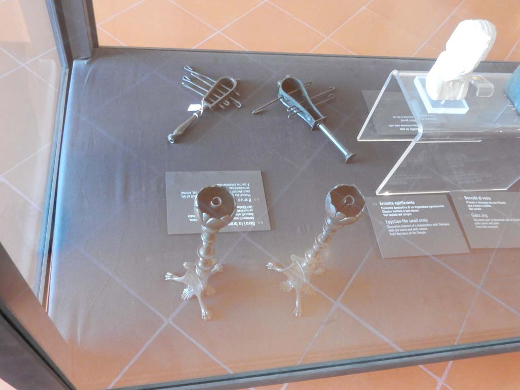 VIII.7.28 Pompeii. June 2019. Found in another wooden box in the temple cella. Two similar but not identical bronze candelabra.
Now in Naples Archaeological Museum. Inventory numbers 72192 and 72193. Photo courtesy of Buzz Ferebee.