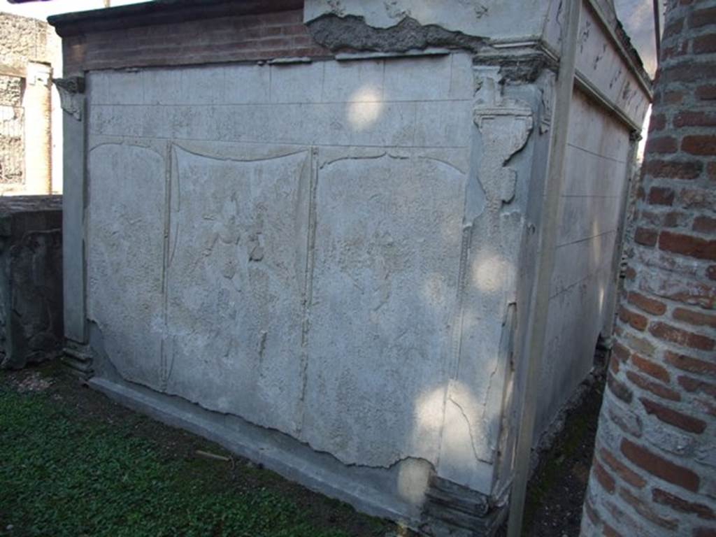 VIII.7.28 Pompeii. March 2009. Purgatorium, west side. Detail of stucco.
The centre panel shows Mars and Venus, with a cupid in the side panels.