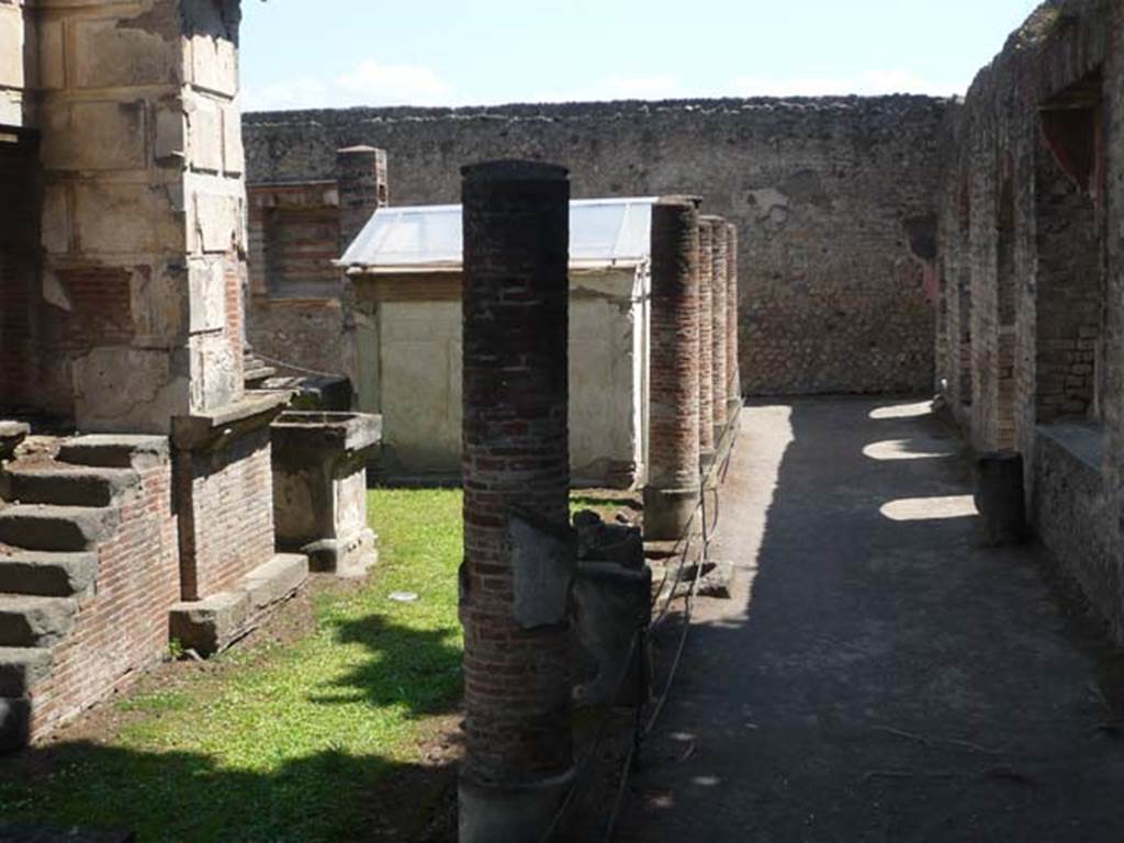 VIII.7.28, Pompeii. May 2011. Looking east along south portico towards purgatorium and pastophorium.
Photo courtesy of Buzz Ferebee.