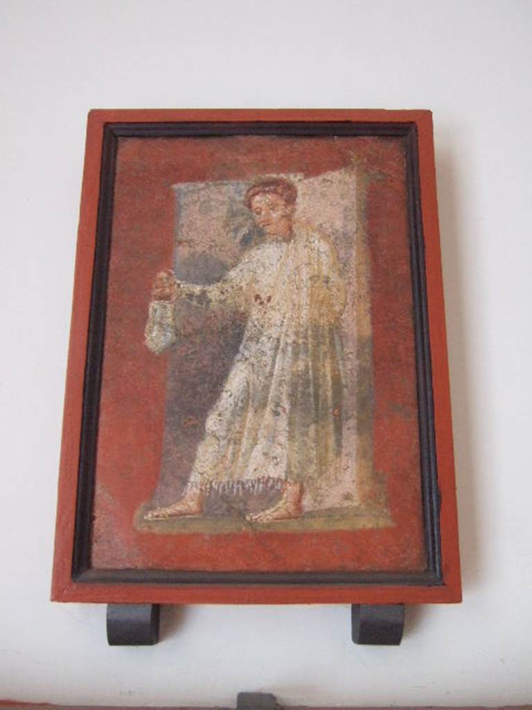VIII.7.28 Pompeii. “Priest bearing a situla or bucket”. Found in panel on right part of south wall. Now in Naples Archaeological Museum.