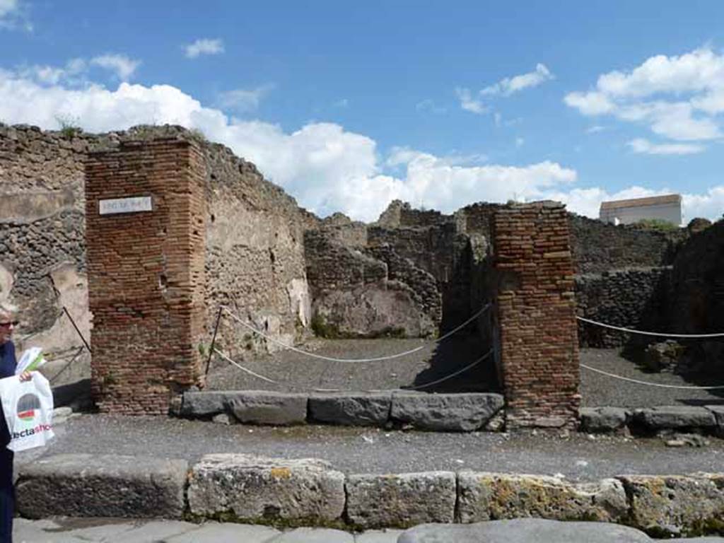 IX.1.1 Pompeii. May 2010. South wall of shop, looking east to rear room.