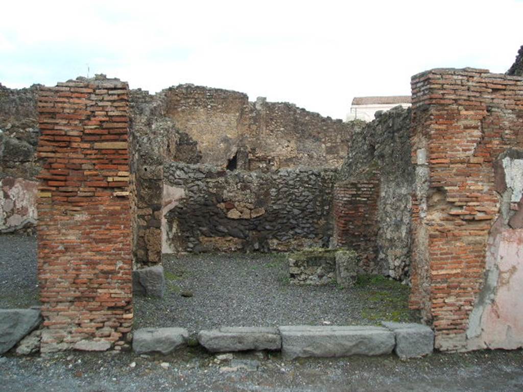 IX.1.2 Pompeii. March 2009.Threshold or sill, with grooves for shutters.