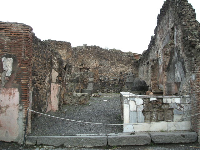 IX.1.3/ IX.1.33 Pompeii. May 2005. Looking south across bakery from near oven. 