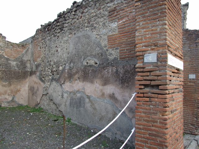 IX.1.4 Pompeii. March 2009. Plaster above hearth in rear room.