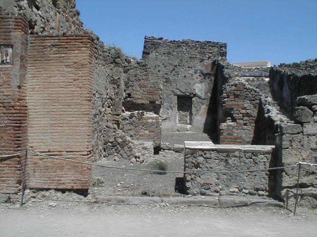 IX.1.6 Pompeii. May 2010. Site of latrine, under stairs to upper floor, on north side of entrance.