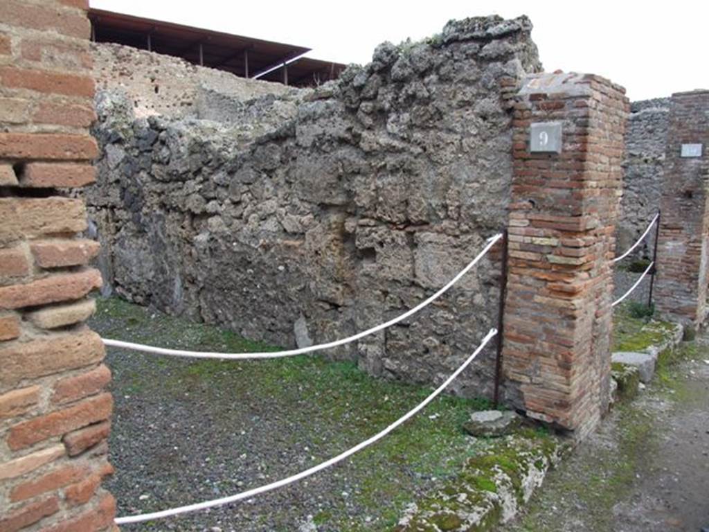 IX.1.9 Pompeii. Shop.  December 2007. East wall of rear room, through doorway from shop.