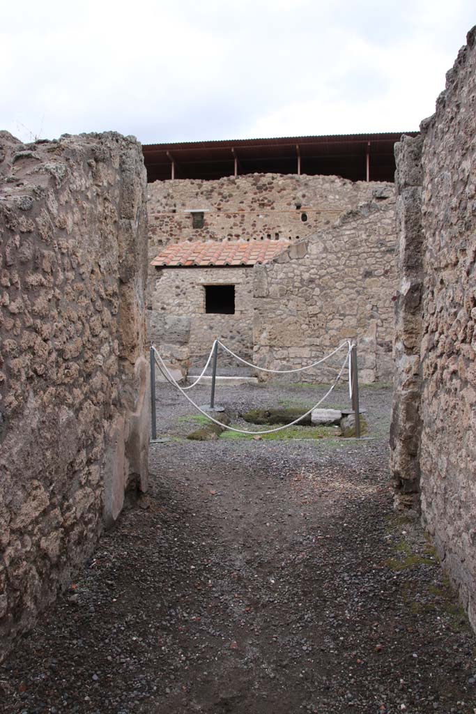 IX.1.12 Pompeii. December 2007. North side of atrium with doorway to cubiculum and triclinium.