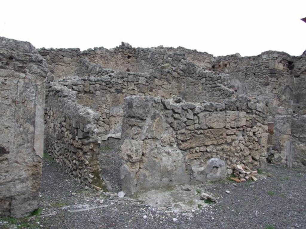 IX.1.12 December 2007. Recess on east wall above door to room on east side of peristyle.