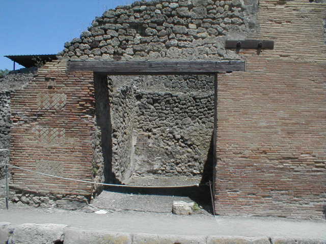 IX.1.14 Pompeii. December 2005. Entrance, looking towards the south-east corner. At the rear would have been a stairs to an upper floor.  