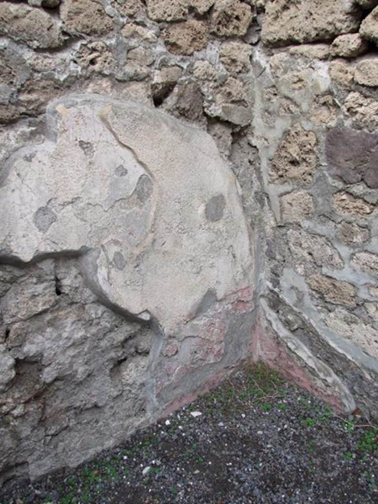 IX.1.16 Pompeii. December 2007. Painted wall plaster on north wall of rear room and north-east corner.