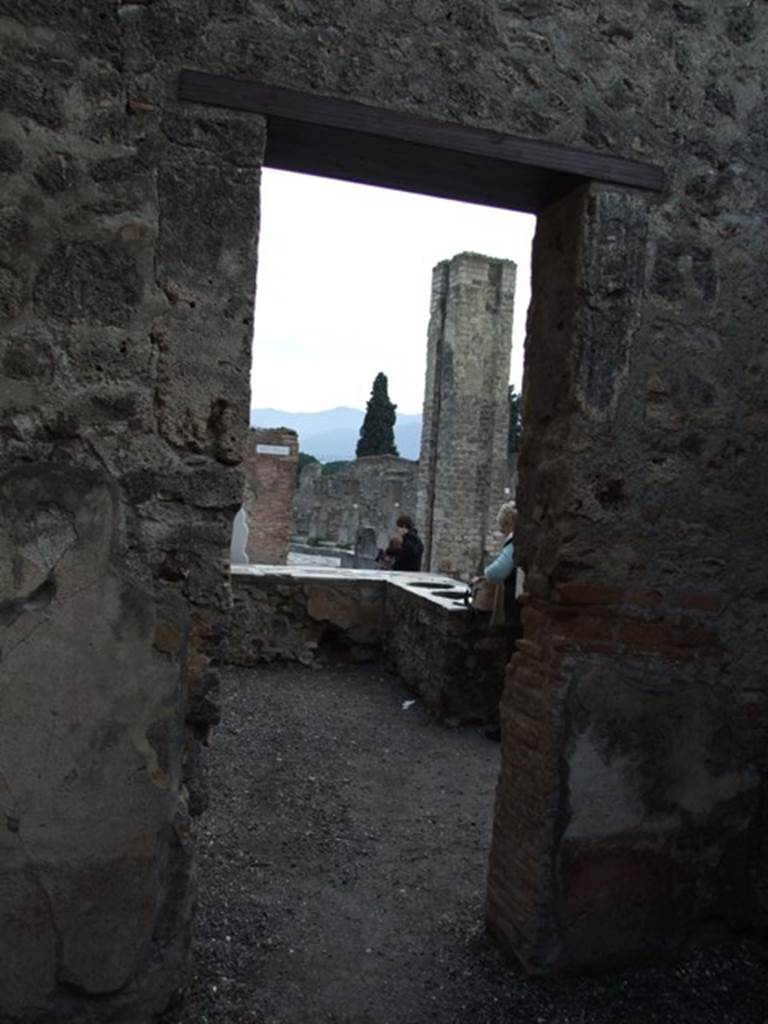 IX.1.16 Pompeii. December 2007. Looking south from doorway of rear room.