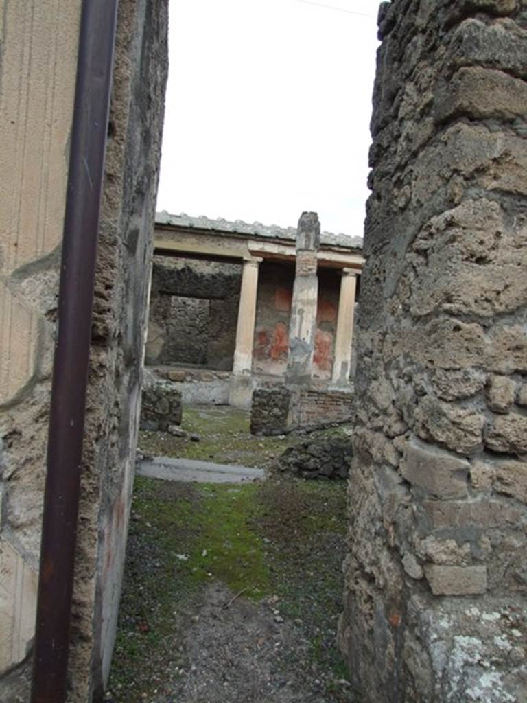 IX.1.22 Pompeii. December 2007. Doorway to corridor with small room on its eastern side, between room 6 and room 7. According to Bragantini, when found this room had a black dado, and the middle zone was painted with purple panels separated by borders.
See Bragantini, de Vos, Badoni, 1986. Pitture e Pavimenti di Pompei, Parte 3. Rome: ICCD. (p.401, corridoio ‘k’)