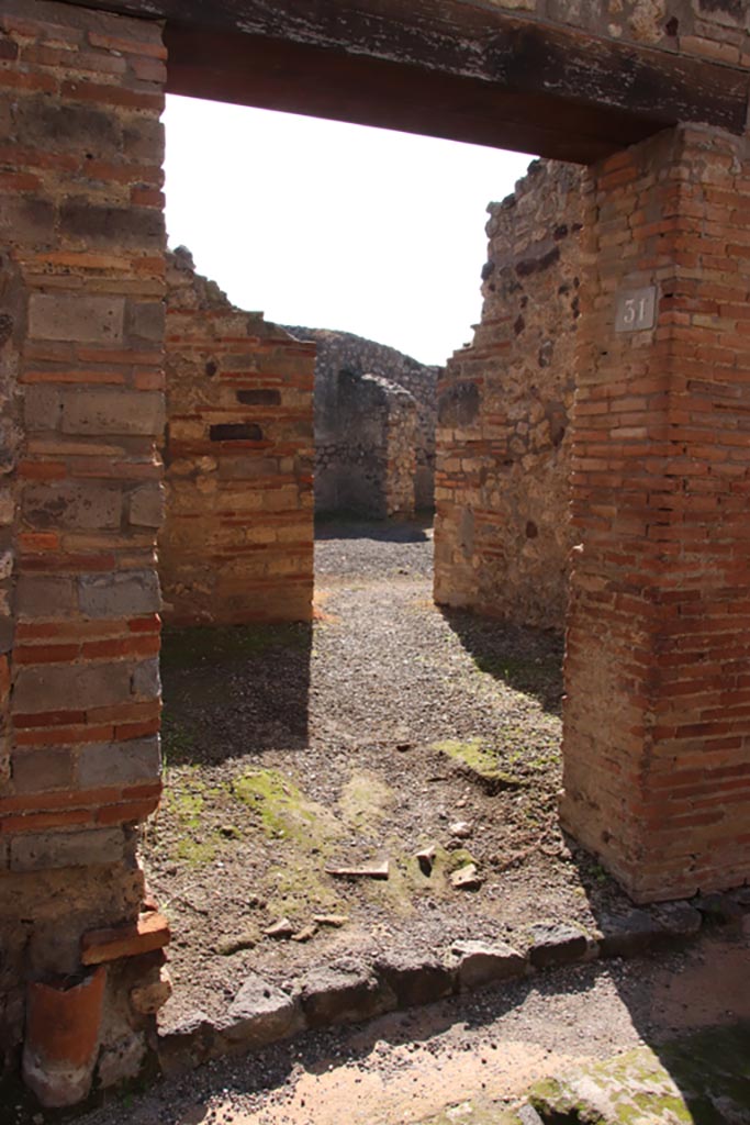 IX.1.31 Pompeii. May 2005. North wall of kitchen.
