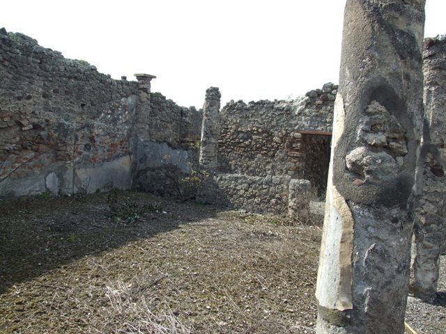 IX.2.17 Pompeii. March 2009. Room 11. Kitchen. Area between hearth and structure.