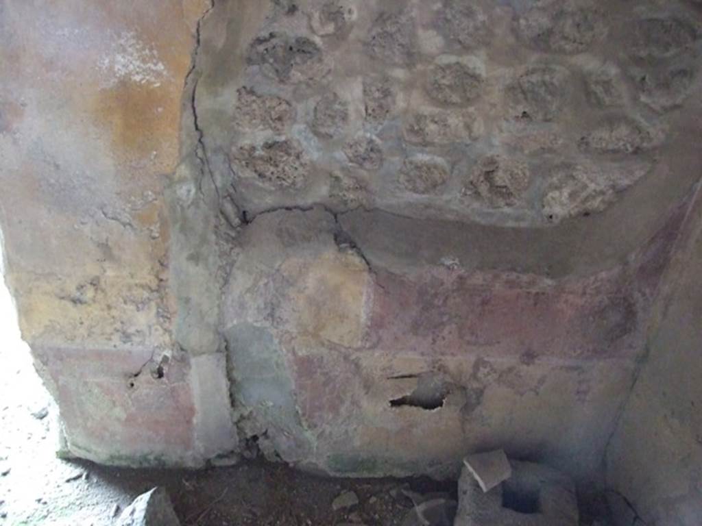 IX.2.21 Pompeii. March 2009. Room 2, north-east corner. On the north wall, the dado was discoloured but seemed to be divided into panels. The middle zone was divided into red and yellow panels by borders and two parallel lines, separated by narrow compartments with candelabra.
See Bragantini, de Vos, Badoni, 1986. Pitture e Pavimenti di Pompei, Parte 3. Rome: ICCD. (p.423, ambiente �h�).
