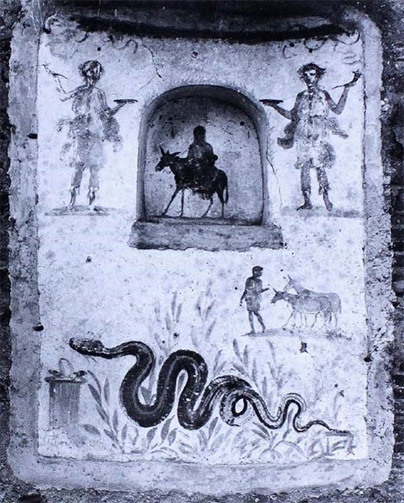 IX.2.24 Pompeii. Old photo of lararium and niche on west wall of stable.
According to Fr�hlich, on the lower left was a painted altar with a snake approaching, through plants, from the right.  
Above right was a man leading two donkeys.  
In the niche was a female figure on a donkey, perhaps Vesta, Epona or Isis-Epona. 
Two Lares were at the top, one on either side of the niche.  
See Fr�hlich, T., 1991, Lararien und Fassadenbilder in den Vesuvst�dten.  Mainz: von Zabern.  (L99: p.293, T. 42,3).
