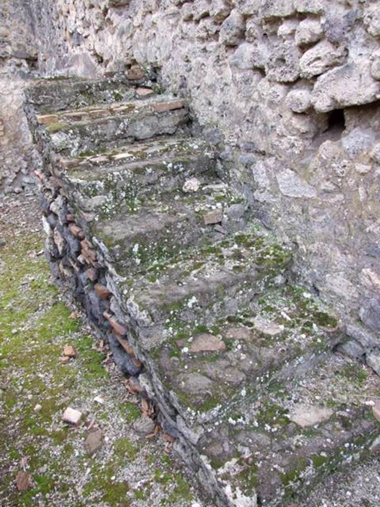 IX.2.24 Pompeii. March 2009. Staircase on west wall of yard area.